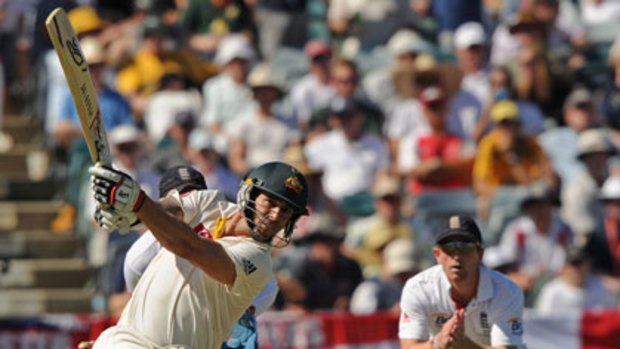 Six! ... fighting tail-ender Mitchell Johnson takes out his frustrations on the England attack yesterday.