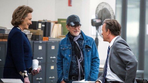 Meryl Streep (left), director Steven Spielberg, and Tom Hanks on the set of the period drama <i>The Post</I>.