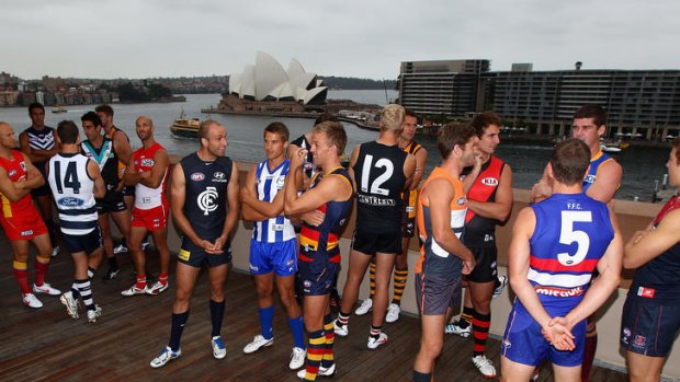 Photo call: The AFL captains in Sydney yesterday.