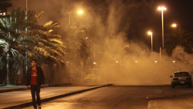 Tear-gas envelops the streets of Manama.