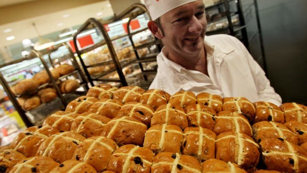 Early risers: A fresh batch of hot-cross buns at a Coles store in Glen Iris.