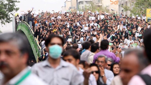 Silent support...a Twitter user posted this picture of a pro-Mousavi rally in Tehran on Thursday. Many wore black to mourn demonstrators killed in earlier clashes.