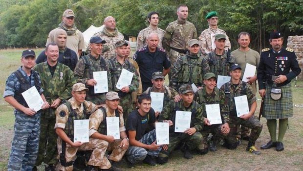 The group at a military training camp in the Ukraine.