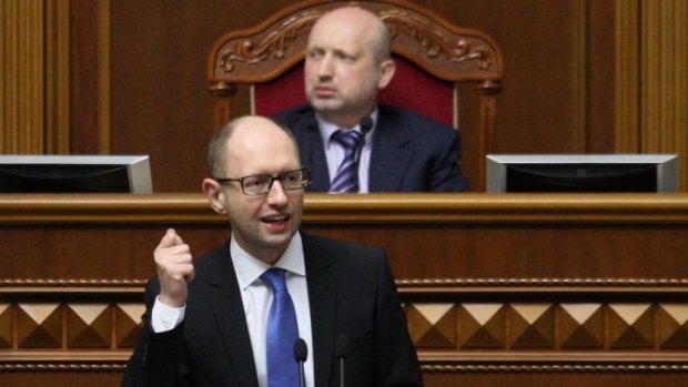 Ukraine's Prime Minister Arseniy Yatsenyuk delivers a speech to deputies of Ukrainian Parliament in Kiev.