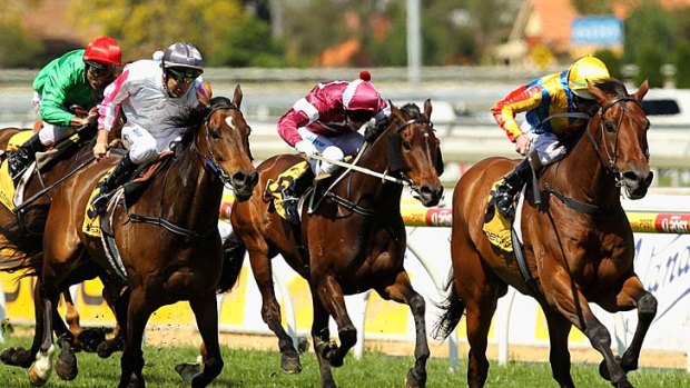 Cosmonaut (right), with Luke Nolen in the saddle, pulls away to win the Betfair Handicap yesterday.