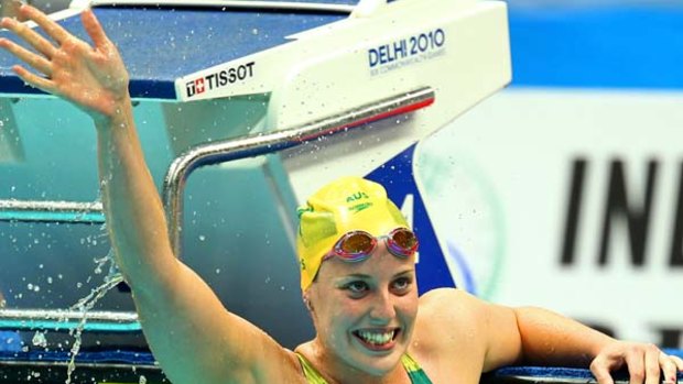 Alicia Coutts of Australia celebrates after winning the 200m individual medley final.