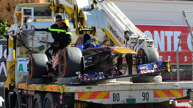 Daniel Ricciardo's car is seen on a truck after he crashed during the Monaco Grand Prix.