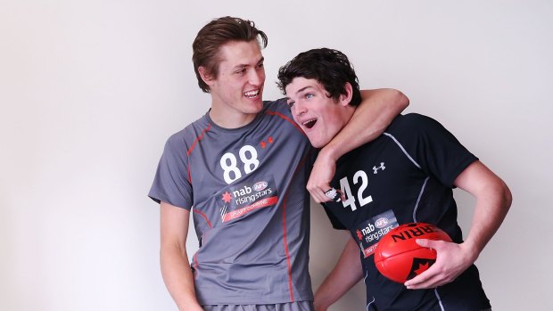 Brayshaw with Darcy Moore. 