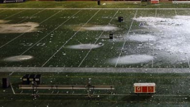 Roof collapse ... snow and debris cover the pitch.