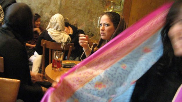 Young women at a north Tehran coffee shop.