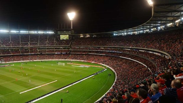 Loud, proud Liverpool fans pack the MCG.