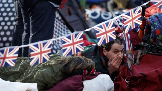 Royal fans camped outside Westminster Abbey.
