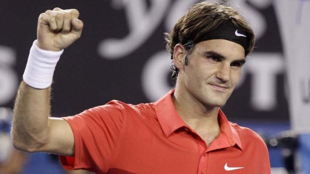 Winner ... a triumphant Roger Federer.