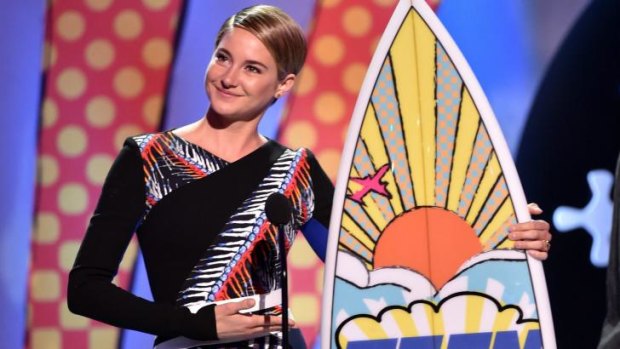 Shailene Woodley, star of <i>Divergent</i> accepts the award for best actress: action.