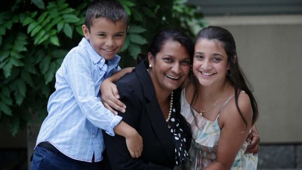 Nova Peris with her children Jack (left) and Destiny (right), at Parliament House in Canberra on Tuesday.