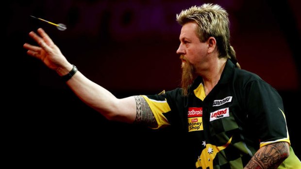 Top shot: Simon Whitlock surges into the quarter-finals of the world championships.