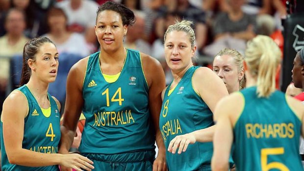 Liz Cambage (second from left) with Opals teammates during Australia's match against Canada at the Olympics.