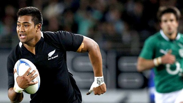 Three-try debutant ... Julian Savea runs in to score his first try.