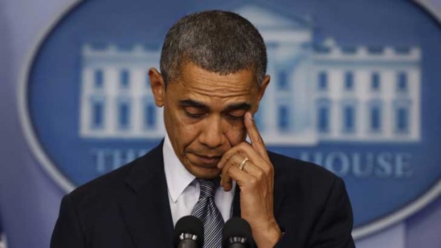 US President Barack Obama speaks about the shooting at Sandy Hook Elementary School in Newtown, Connecticut, during a press briefing at the White House in Washington.