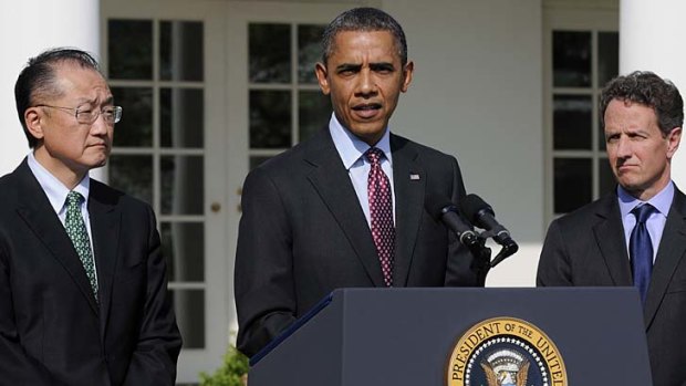 President Barack Obama (centre), with Treasury Secretary Timothy Geithner (right), introduces Jim Yong Kim as his nominee to be the next president of the World Bank.