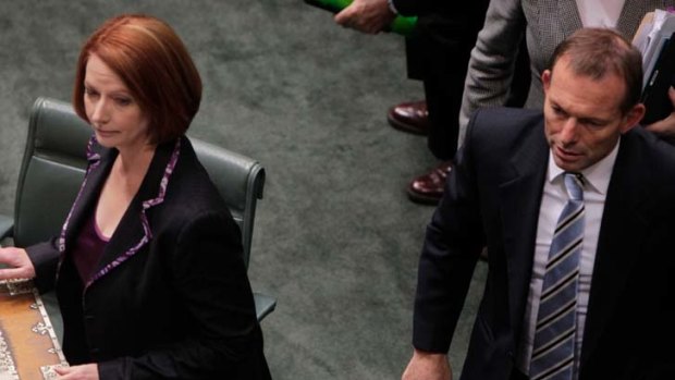 Opposition Leader Tony Abbott and Prime Minister Julia Gillard are facing off over the Coalition's promised tax cuts.