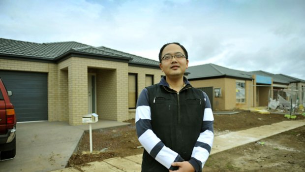 Lonely: Tony Zhang outside his house at Watagan Street, Tarneit. He and his wife are the first residents of The Reserve. 