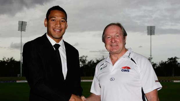 Israel Folau and Kevin Sheedy at the press conference to announce the signing of the Brisbane Broncos star.