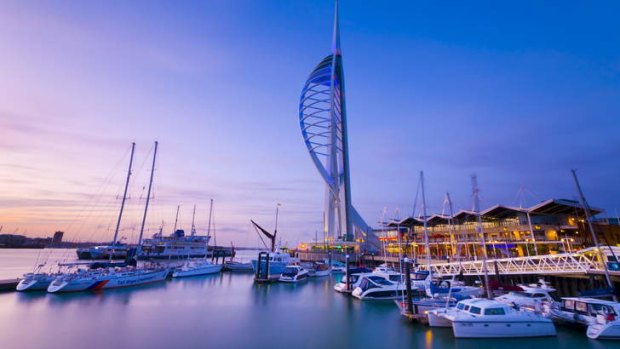 The Spinnaker Tower soars  above Portsmouth's harbour.
