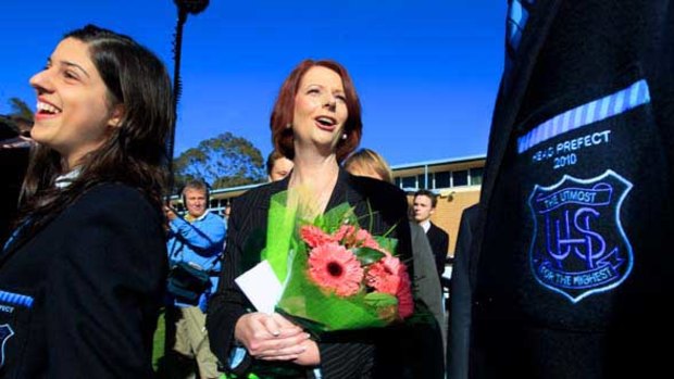 Julia Gillard talks to head prefects Tina Halikias and Tom Merrett at Unley High School.