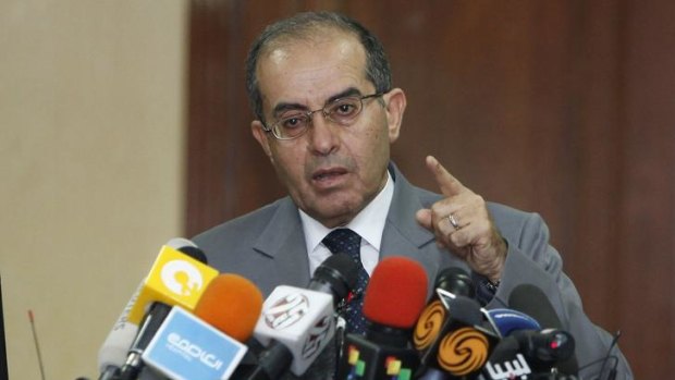 Mahmoud Jibril, de facto prime minister of the National Transitional Council, speaks during a news conference in Tripoli.
