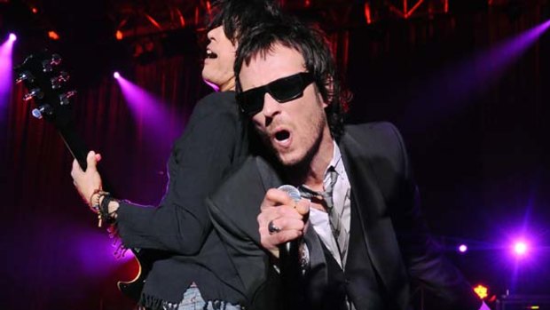Scott Weiland, right, and Dean DeLeo of Stone Temple Pilots performing in Los Angeles in 2008.