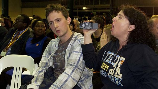 Jordan Nash, 22, (left) sits while his mother Jennifer heckles Prime Minister Julia Gillard during a public forum in Ipswich, west of Brisbane.