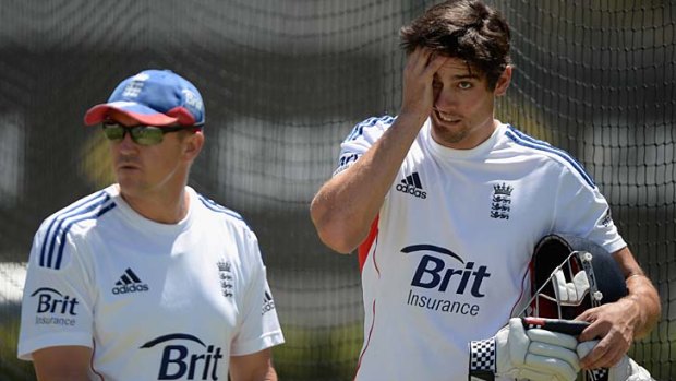 Another one gone: Andy Flower (left) with Alastair Cook.