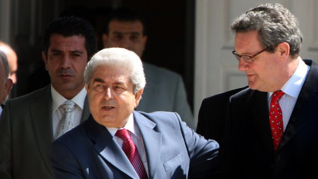 Alexander Downer (right) meets Cypriot President Dimitris Christofias.