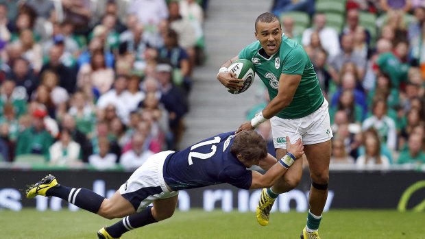 Forward momentum halted: Ireland's Simon Zebo is tackled by Scotland's Peter Horne.