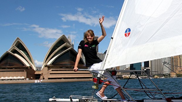 Tough proposition ... teen solo sailor Jessica Watson sails into Sydney Harbour on Wednesday on the first stage of her round the world trip.