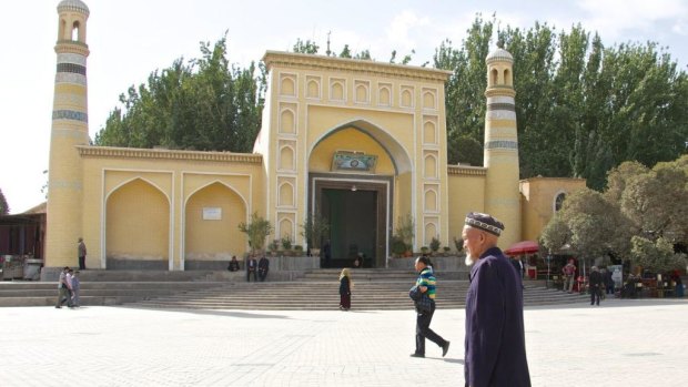 An elderly Uighur man in front of Kashgar's Id Kah mosque in Xinjiang, China.