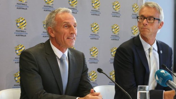 All ears: FFA CEO David Gallop (right) listens to newly appointed technical director Eric Abrams in Sydney on Wednesday.