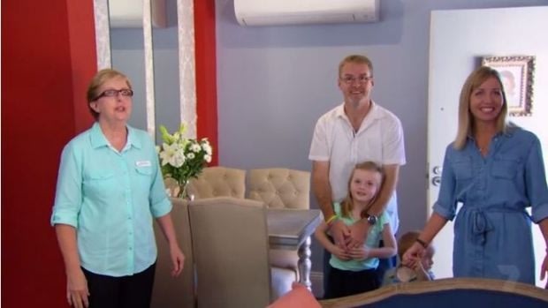 Canberra man Judd Hoyle and his family with Bezzina House manager Denise Clancy as they inspect Kate and Harry's makeover of one of the rooms at the cancer lodge on House Rules.