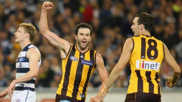 Hawthorn's Jordan Lewis celebrates after kicking a goal against Geelong at the MCG on Friday.
