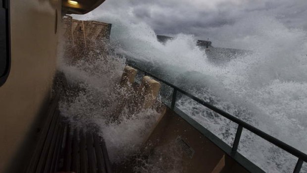 Wild start to the week: commuters on the Manly ferry had a bumpy ride to work.