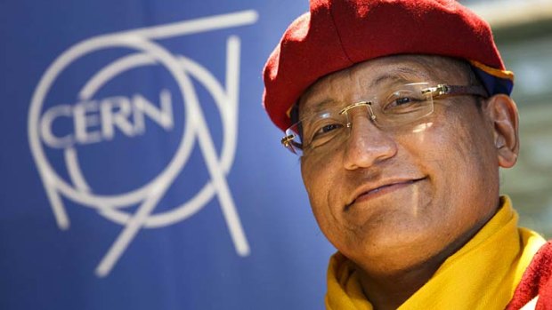 The 12th Gyalwang Drukpa, Jigme Pema Wangchen, smiles as he visits the ATLAS experiment at the European Organization for Nuclear Research (CERN).