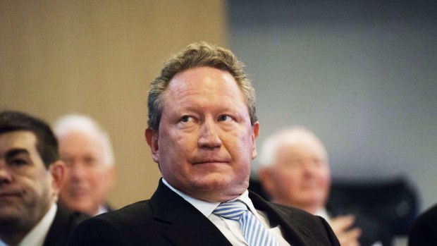 The price of iron ore is being smashed and despite his best efforts, the value of Andrew Forrest's shares in his Fortescue Metals Group is taking a beating as well.