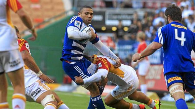 Cleaned up ... Bryan Habana of the Stormers is cut down in a tackle.