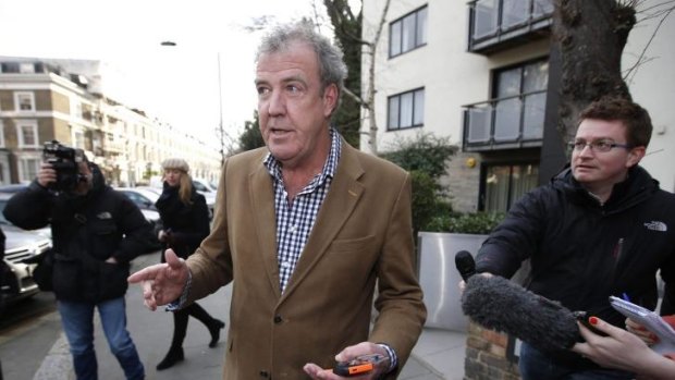 Polarising figure ... British television presenter Jeremy Clarkson leaves his London home on Tuesday. Nearly 450,000 fans from around the world have backed a petition calling for Clarkson to be reinstated to his job hosting Top Gear. 