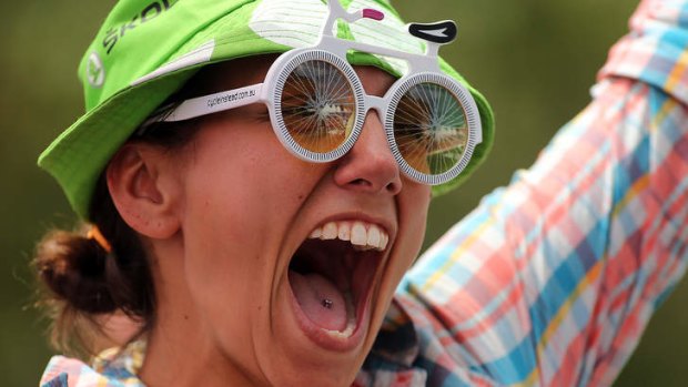 A spectator enjoys the atmosphere at the finish line during Stage Three of the Tour Down Under.