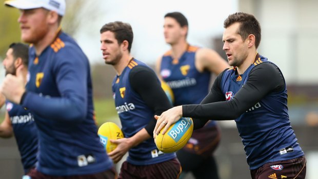 Aiming to conquer the West: Skipper Luke Hodge and his Hawks train on Tuesday.