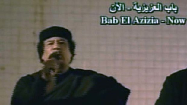 Public appearance ... Muammar Gaddafi addresses his supporters.
