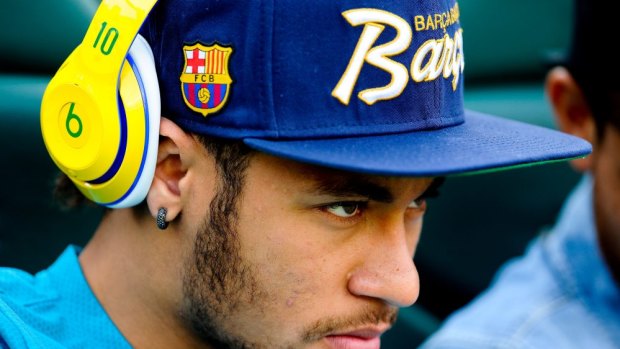 Fashion accessory: Brazilian star Neymar with his trademark yellow headphones.