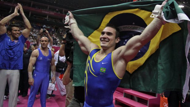 Golden boy ... Brazil's Arthur Zanetti sent his country into raptures when he upset China's "Lord of the Rings", Chen Yiben, to win the  men's rings competition.